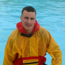 pool lifeguard swimming in uniform clothes